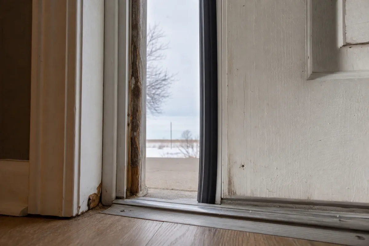 Close view of ordinary exterior door weatherstripping for Hastings pre-winter repair